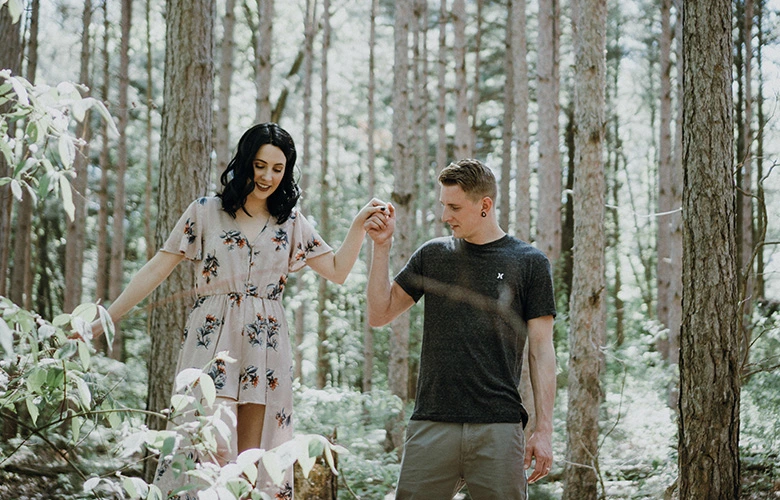 A Gemini and Taurus couple wandering around the forest