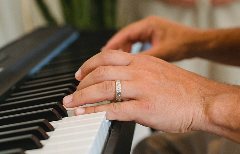 A married man playing the piano for his mistress