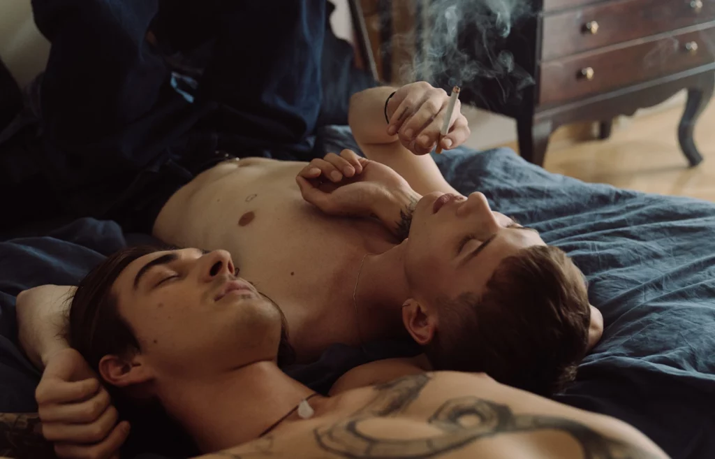 Gay couple having a goodtime in bed