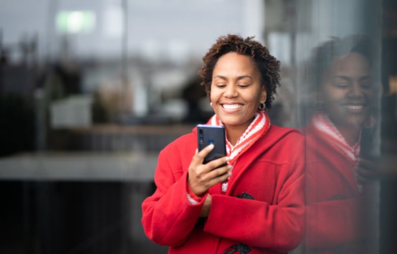 Woman reading chats on a dating app