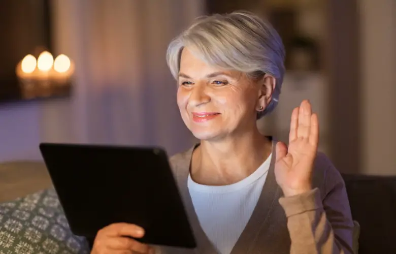 50-year-old woman on the phone having a virtual date