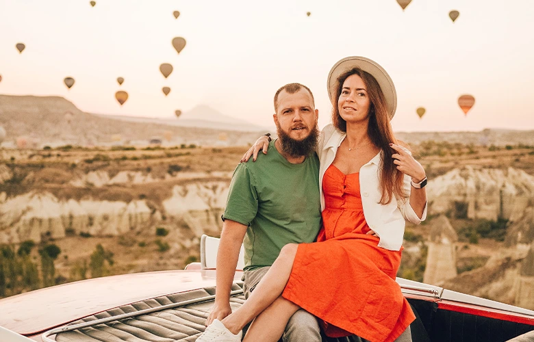 A couple dating in an air balloon show