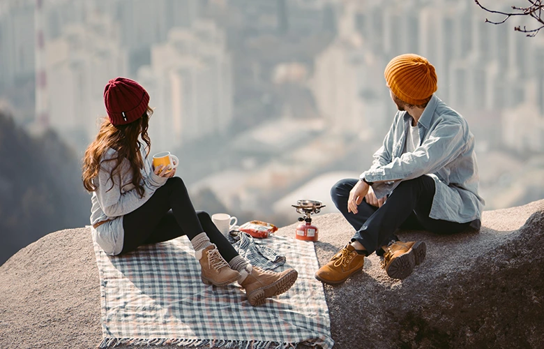 A couple dating on a mountain